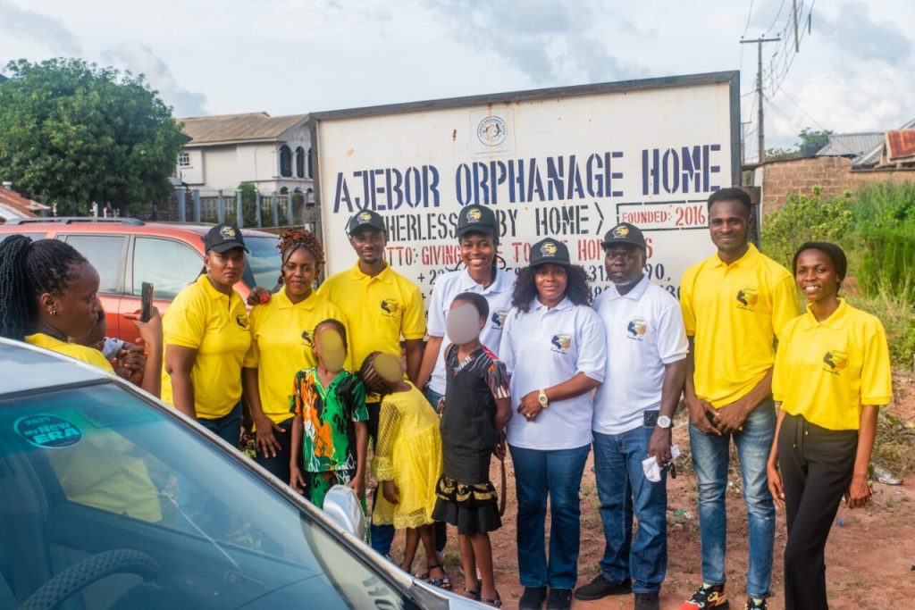 Impact visit to ajebor orphanage home blurred
